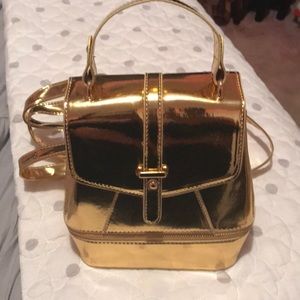 Metallic gold mini backpack